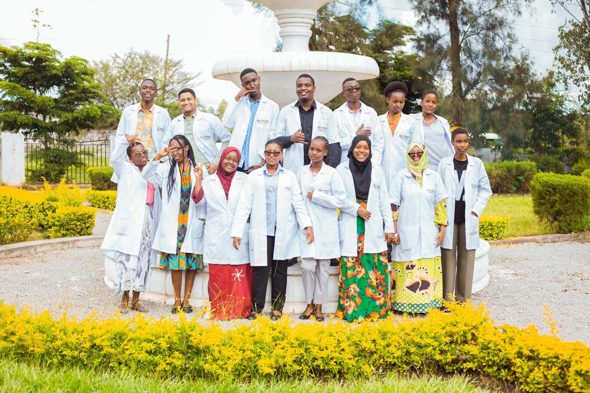 Mwanza University students gathered at the campus fountain